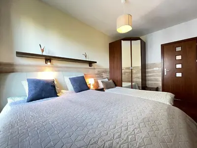 Łóżko lub łóżka w pokoju w obiekcie Superior Pulawska, 4 rooms, 3 bedrooms, Metro! Recepcion24h!