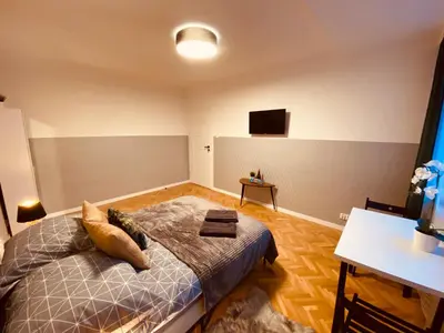 Telewizja i/lub zestaw kina domowego w obiekcie ClickTheFlat Karmelicka Apart Rooms