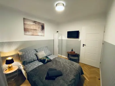 Telewizja i/lub zestaw kina domowego w obiekcie ClickTheFlat Karmelicka Apart Rooms