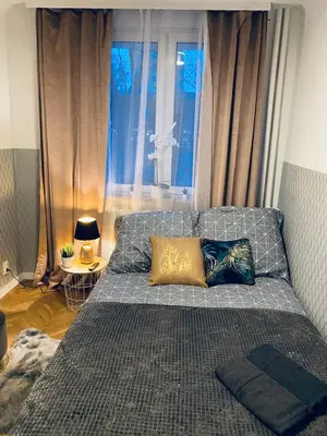Łóżko lub łóżka w pokoju w obiekcie ClickTheFlat Karmelicka Apart Rooms