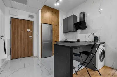Kuchnia lub aneks kuchenny w obiekcie Warsaw Business Apartments - Air Conditioning, 10th Floor, City View, Balcony - by Rentujemy