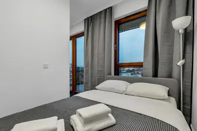 Łóżko lub łóżka w pokoju w obiekcie Metro Wierzbno Cosy Apartment by BookingHost