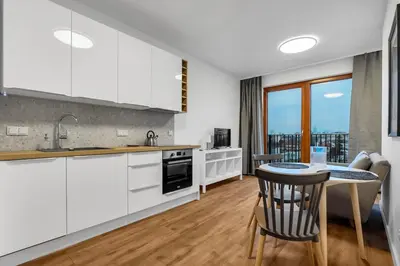 Kuchnia lub aneks kuchenny w obiekcie Metro Wierzbno Cosy Apartment by BookingHost