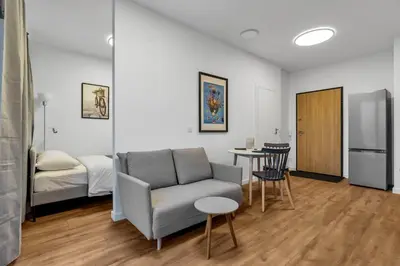 Część wypoczynkowa w obiekcie Metro Wierzbno Cosy Apartment by BookingHost
