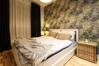 Łóżko lub łóżka w pokoju w obiekcie 2HomeRent Nowa Mangalia