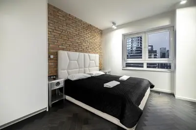 Łóżko lub łóżka w pokoju w obiekcie Black Pearl - Amazing City View, 130 sqm