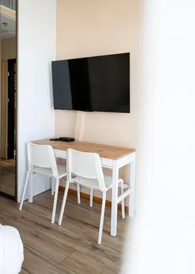 Telewizja i/lub zestaw kina domowego w obiekcie RentPlanet - Apartamenty Kasprzaka