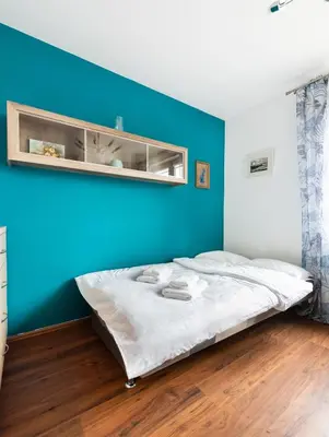 Łóżko lub łóżka w pokoju w obiekcie Ceramiczna Comfort Studio by BookingHost
