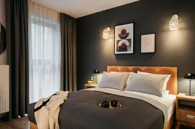 Łóżko lub łóżka w pokoju w obiekcie ORSO Rooms & Apartments by StayLab
