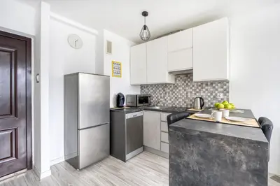Kuchnia lub aneks kuchenny w obiekcie Central Apartment Rondo ONZ