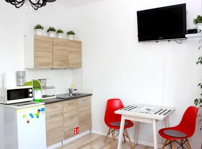 Kuchnia lub aneks kuchenny w obiekcie WSTApartments Młynarska 13