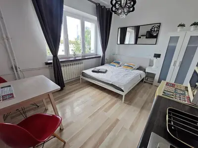 Łóżko lub łóżka w pokoju w obiekcie WSTApartments Młynarska 13