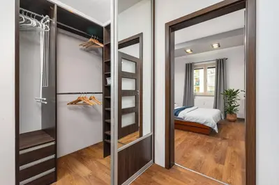 Łóżko lub łóżka w pokoju w obiekcie Apartament Mokotów -basen-