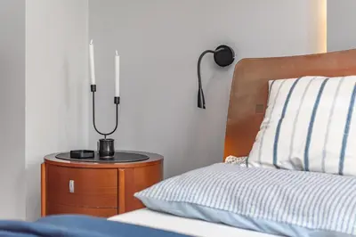 Łóżko lub łóżka w pokoju w obiekcie Apartament Mokotów -basen-