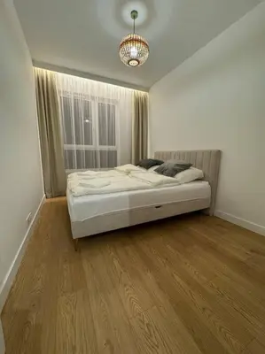 Łóżko lub łóżka w pokoju w obiekcie Forest Apart IV