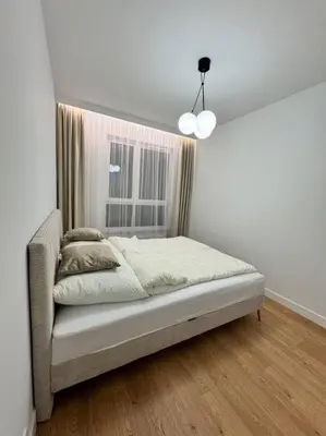 Łóżko lub łóżka w pokoju w obiekcie Forest Apart IV