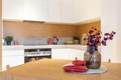 Kuchnia lub aneks kuchenny w obiekcie SuperApart Kolejowa 45 - Nowoczesny apartament na Woli