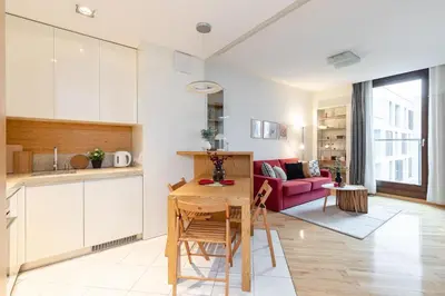 Kuchnia lub aneks kuchenny w obiekcie SuperApart Kolejowa 45 - Nowoczesny apartament na Woli