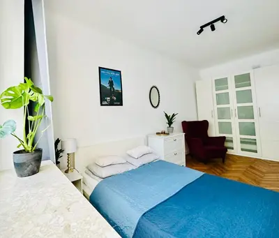 Łóżko lub łóżka w pokoju w obiekcie Baja Apartment Warsaw