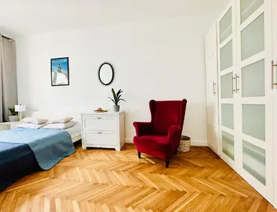Łóżko lub łóżka w pokoju w obiekcie Baja Apartment Warsaw