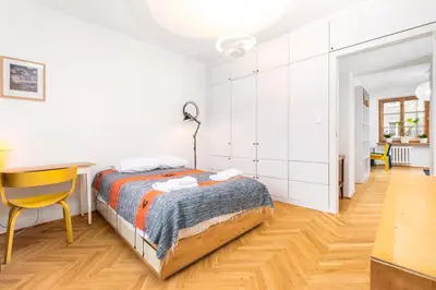 Łóżko lub łóżka w pokoju w obiekcie Dymińska 10A by Homeprime