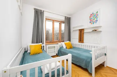 Łóżko lub łóżka w pokoju w obiekcie Dymińska 10A by Homeprime