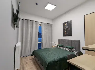 Telewizja i/lub zestaw kina domowego w obiekcie Sleep & go A13