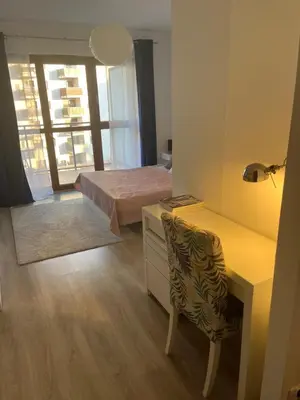Łóżko lub łóżka w pokoju w obiekcie Apartament JANA KAZIMIERZA 66