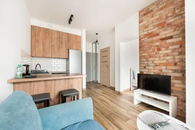 Kuchnia lub aneks kuchenny w obiekcie Wola Homely Apartment #88 by BookingHost