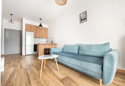 Kuchnia lub aneks kuchenny w obiekcie Wola Homely Apartment #106 by BookingHost