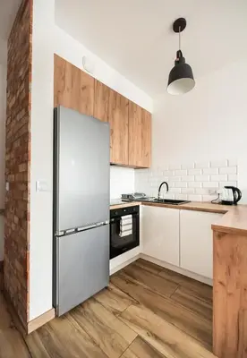 Kuchnia lub aneks kuchenny w obiekcie Wola Homely Apartment #106 by BookingHost
