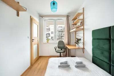 Łóżko lub łóżka w pokoju w obiekcie Daniszewska Cosy Apartment by BookingHost