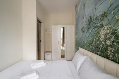 Łóżko lub łóżka w pokoju w obiekcie Business Park Cosy Apartment by BookingHost