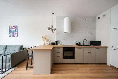 Kuchnia lub aneks kuchenny w obiekcie Business Park Cosy Apartment by BookingHost