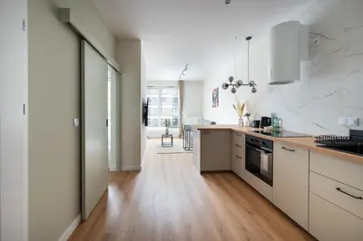 Kuchnia lub aneks kuchenny w obiekcie Business Park Cosy Apartment by BookingHost