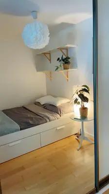 Łóżko lub łóżka w pokoju w obiekcie Comfortable apartment in Warsaw Bielany