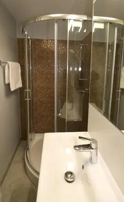 Łazienka w obiekcie Falcon Apartment Center 4 Metro Świętokrzyska
