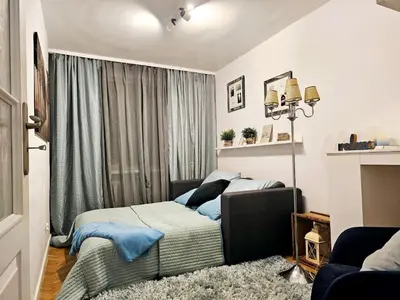 Łóżko lub łóżka w pokoju w obiekcie WELCOME Apartment Warsaw