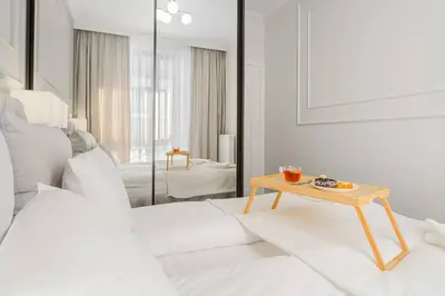 Łóżko lub łóżka w pokoju w obiekcie ShortStayPoland Premium Herbu Korczak (P2)