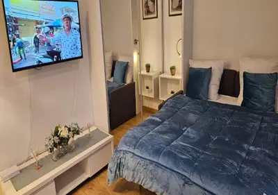 Łóżko lub łóżka w pokoju w obiekcie Zlatarooms 202