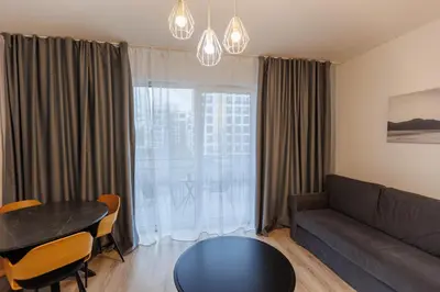 Część wypoczynkowa w obiekcie 2-108 Wola, Jana Kazimierza 32, Warsaw, cozy city view, Petrovdom Apartment