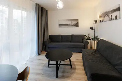 Część wypoczynkowa w obiekcie 2-108 Wola, Jana Kazimierza 32, Warsaw, cozy city view, Petrovdom Apartment