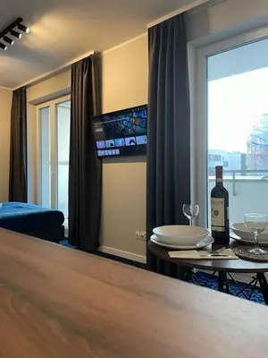 Telewizja i/lub zestaw kina domowego w obiekcie Premium Apartment VICTORIA 38