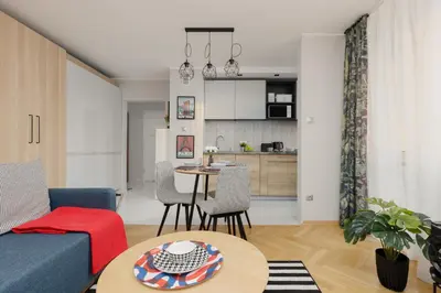 Kuchnia lub aneks kuchenny w obiekcie Stylish Apartment with Balcony Żoliborz Warsaw by Noclegi Renters