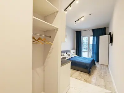 Łóżko lub łóżka w pokoju w obiekcie MoonApart A2