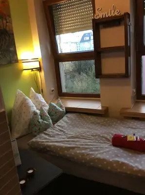 Łóżko lub łóżka w pokoju w obiekcie Chmielna mikro room - Adults Only