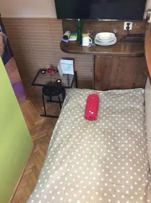 Łóżko lub łóżka w pokoju w obiekcie Chmielna mikro room - Adults Only