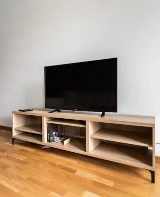 Telewizja i/lub zestaw kina domowego w obiekcie Praga Chic Apartment by BookingHost
