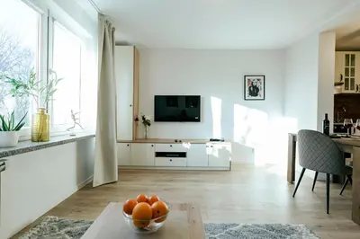 Telewizja i/lub zestaw kina domowego w obiekcie Jana Pawła 55 - Bardzo wygodne studio w centrum Warszawy - Better Rental