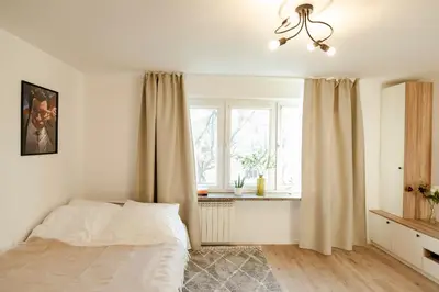 Łóżko lub łóżka w pokoju w obiekcie Jana Pawła 55 - Bardzo wygodne studio w centrum Warszawy - Better Rental